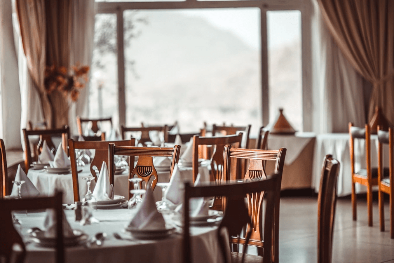 Utilize curtains, area rugs, and tablecloths